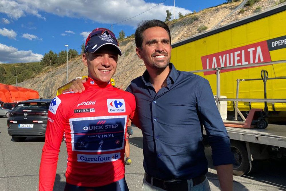 Belgian Remco Evenepoel of QuickStep Alpha Vinyl and EoloKometa general manager Alberto Contador pictured after stage 20 of the 2022 edition of the Vuelta a Espana Tour of Spain cycling race from Moralzarzal to Puerto de Navacerrada 181km Spain Saturday 10 September 2022 BELGA PHOTO ANN BRAECKMAN Photo by ANN BRAECKMAN BELGA MAG Belga via AFP Photo by ANN BRAECKMANBELGA MAGAFP via Getty Images