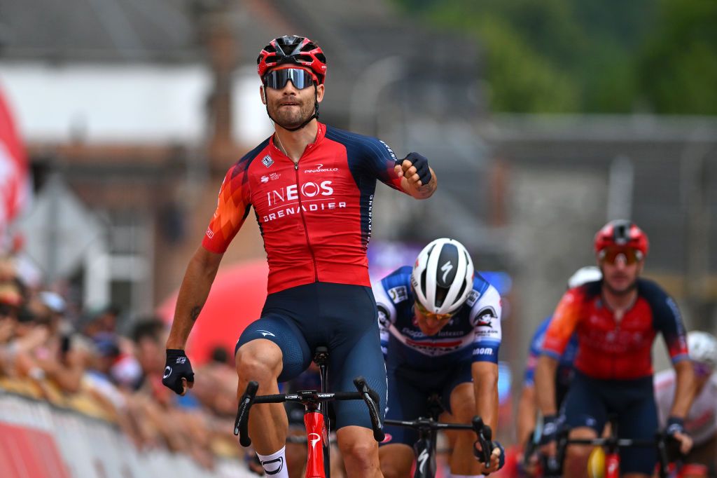 HAMOIR BELGIUM JULY 22 Filippo Ganna of Italy and Team INEOS Grenadiers celebrates at finish line as stage winner ahead of Davide Ballerini of Italy and Team SoudalQuick Step during the stage one of the 44th EthiasTour de Wallonie 2023 a 1896km stage from Huy to Hamoir UCIWT on July 22 2023 in Hamoir Belgium Photo by Luc ClaessenGetty Images